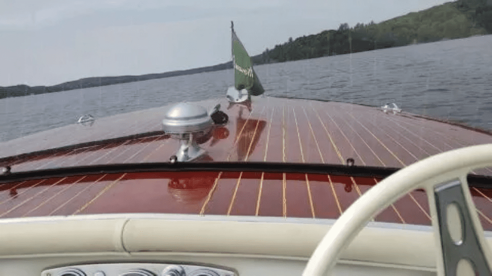 Vintage wooden boat on a lake