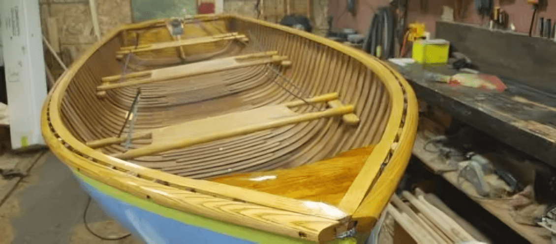 Handcrafted boat with wooden oars